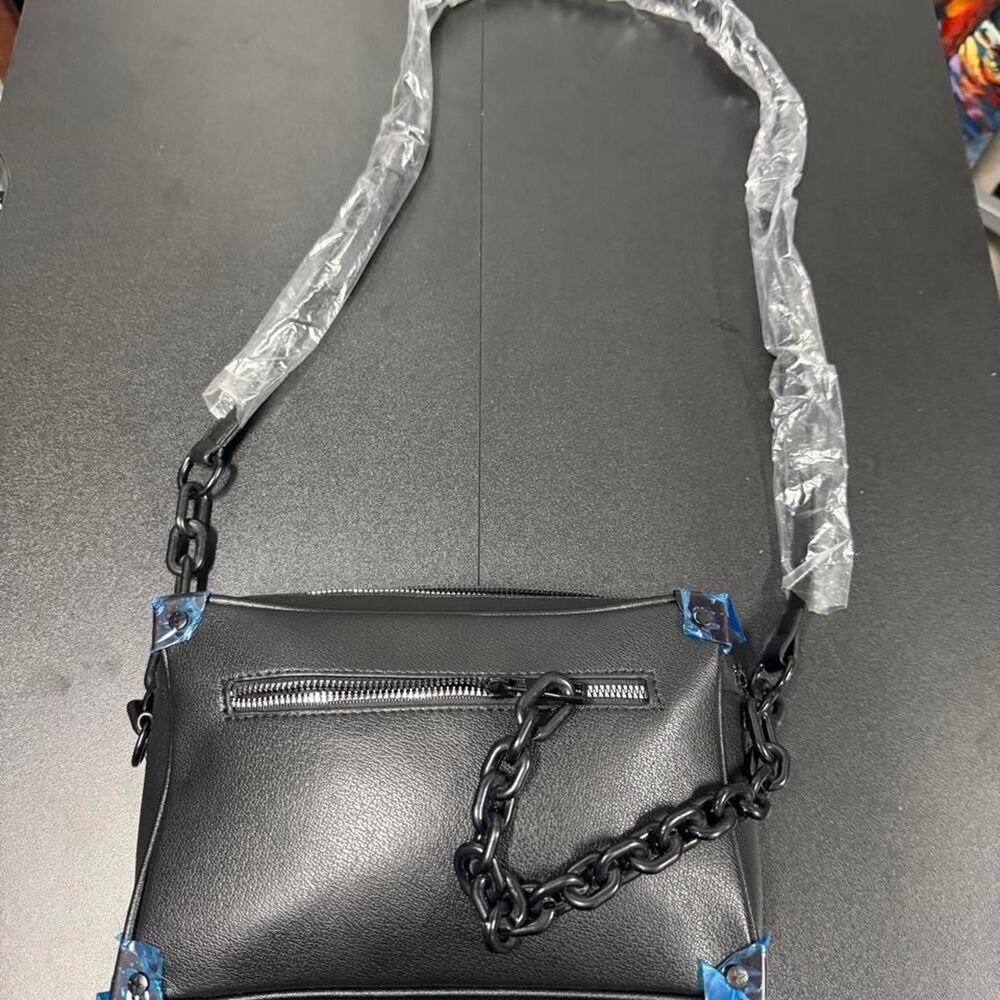 Black leather crossbody bag with chain strap